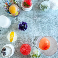 Edible flowers, fruit, herbs, and berries make for memorable cocktails